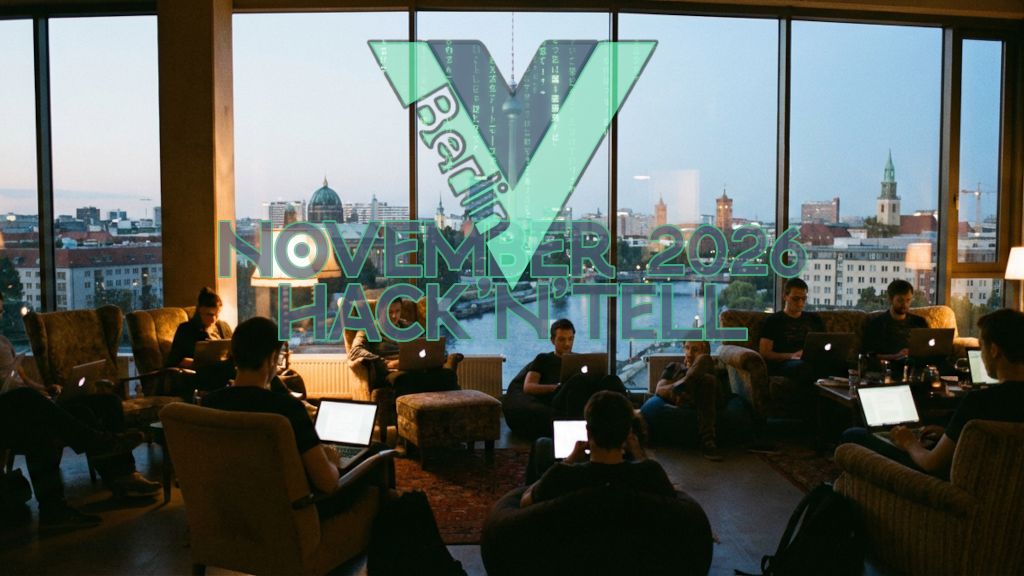 People sitting in a barely lit room with laptops, in front of a large window showing the Berlin skyline with the Vuejs Berlin logo.